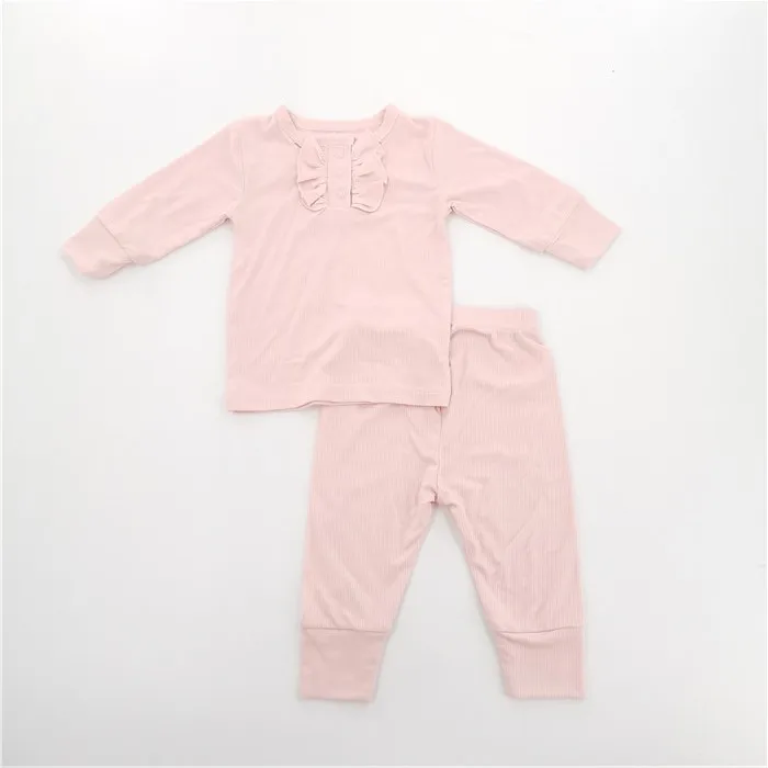 Wholesale bamboo baby pajamas in soft, breathable fabric for retailers seeking eco-friendly, premium-quality infant apparel. Perfect for sustainable baby clothing collections.