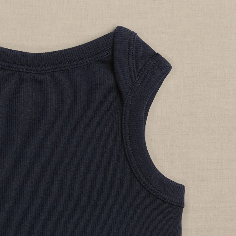 Wholesale custom bamboo baby pajamas in soft, eco-friendly fabric, perfect for retailers seeking sustainable and premium baby clothing options.