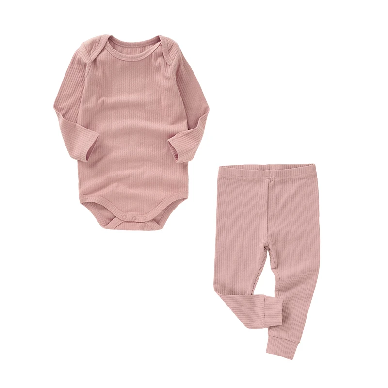 Soft bamboo romper in neutral tones, ideal for B2B wholesale buyers seeking eco-friendly, sustainable baby clothing for retail stores.